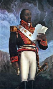 Haitian Revolutionary, Toussaint Louverture, reading from a paper.