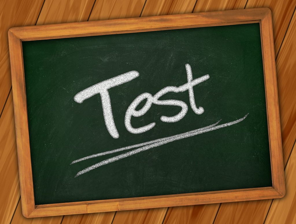 Drawing of a chalkboard with the word "Test" written in chalk and underlined.