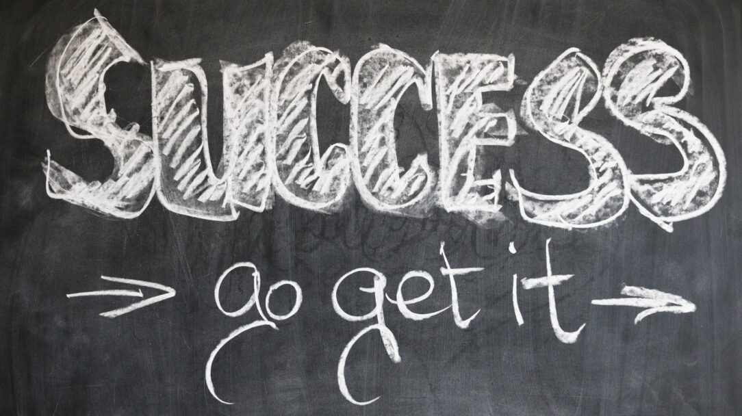 Blackboard with the phrase, "Success, Go Get It!" written on it.