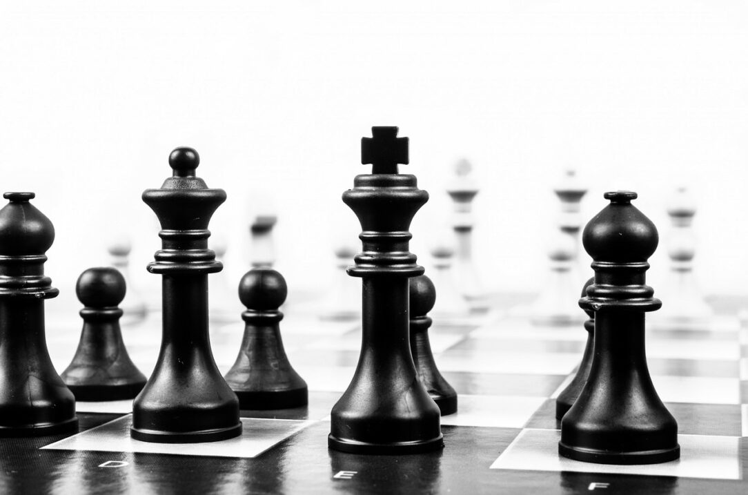 Pieces In Positions Of Power: A Chess Analogy